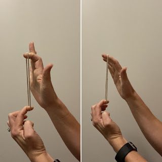 Demonstration of resisted finger extension exercise, a method to prevent rock climbing injuries by strengthening finger extensors